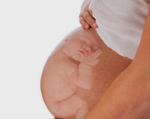 Kobieta w ciąży - dziecko w brzuchu