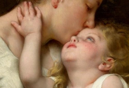 Rozpieszczanie - matka całuje dziecko