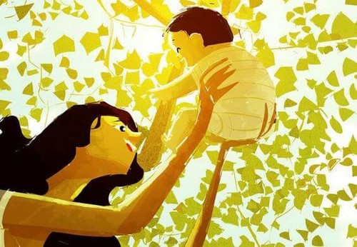 Matka trzymająca swoje dziecko w górze