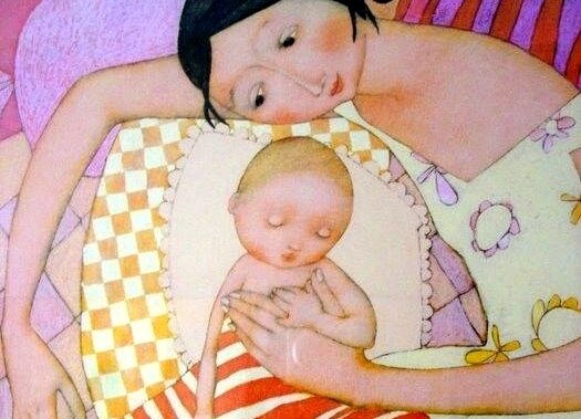 Rysunek mamy przytulającej niemowlę śpiące na poduszce i zapewniającej mu kontakt fizyczny